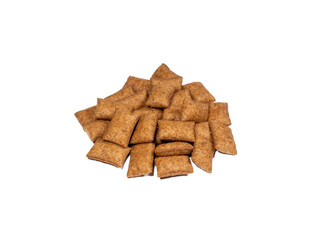 Cat crunchy biscuits. Pile of dry cat food isolated on white background. Pet treats with different fillings