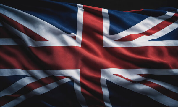 A close-up shot of the British flag waving in the wind