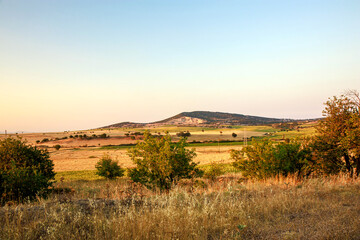 landscape view of open fields and hills