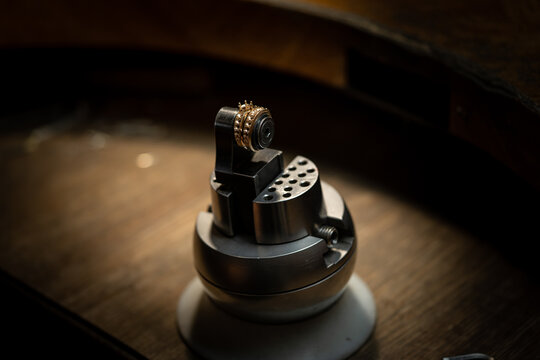 The work of jewelers. Trial jewelry of semiprecious metals. Ring. Selective focus. Macro photo.