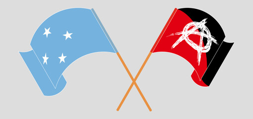 Crossed and waving flags of Micronesia and Anarchy