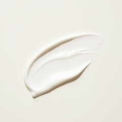 Balm swatch, A smear of cream on a blank background.
