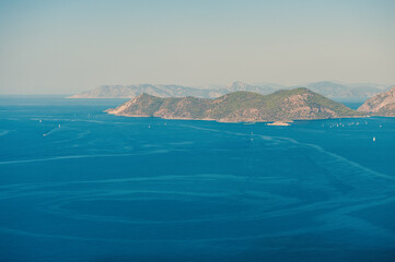 Obraz premium Arial beautiful view with big cliff, water of sea and sky