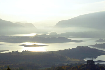 Early morning on Rama Lake (Ramsko jezero): view from above of the water sparkling in the sun, numerous islands and stunning mountains. Natural beauty of Bosnia and Herzegovina.