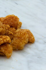 Homemade pork rinds or chicharrones carnudos in Spanish, easy to make in a kitchen pan. They are crunchy, meaty and delicious.