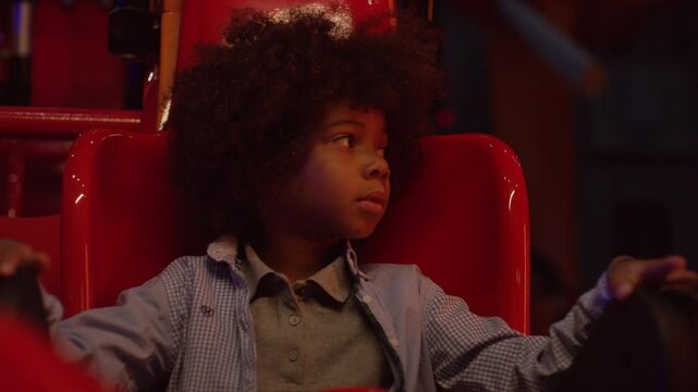 Scared kid in a roller coaster