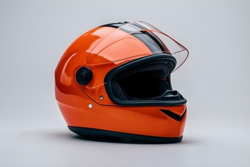 Glossy orange motorcycle helmet with black accents, set against white background