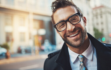 Fototapeta premium Portrait, business and man with fashion, outdoor and glasses with urban town, corporate clothes and smile. Face, employee and consultant in street, stylish outfit and eyewear with travel and New York