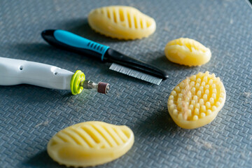close-up In the grooming salon on  silver table there are professional accessories for caring for...