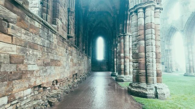 Foggy winters scene of the famous landmark Whitby Abby now derelict and formally a Benedictine abbey and is situated overlooking the sea on the East coast of England