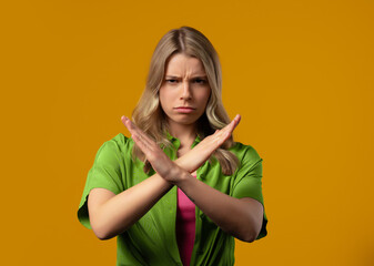 No, never, young woman rejecting gesture stop crossing hands. Ban, timeout.