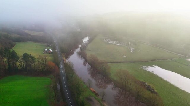 Ruswarp is a pretty village that lies in the scenic Esk Valley, just one mile south of Whitby. Misty Yorkshire landscape scene. Coastal winter setting