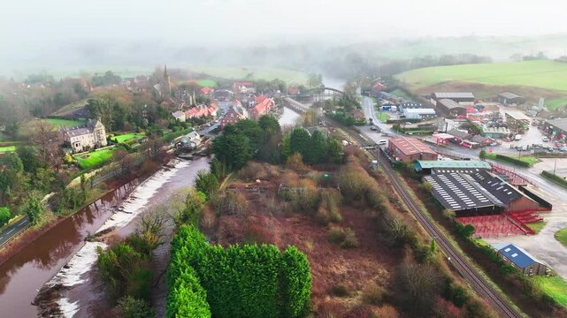 Ruswarp is a pretty village that lies in the scenic Esk Valley, just one mile south of Whitby. Misty Yorkshire landscape scene. Coastal winter setting