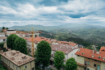 Exploring the picturesque architecture and landscapes of San Marino's hillside neighborhoods on a...