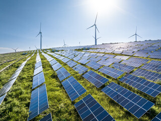 view of solar power station and wind power station on hill