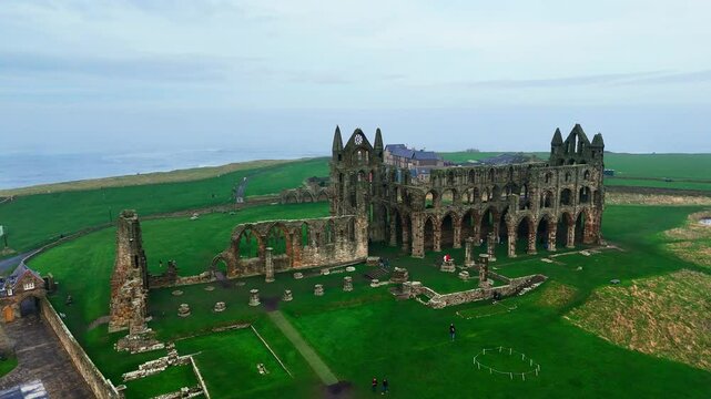 Foggy winters scene of the famous landmark Whitby Abby now derelict and formally a Benedictine abbey and is situated overlooking the sea on the East coast of England