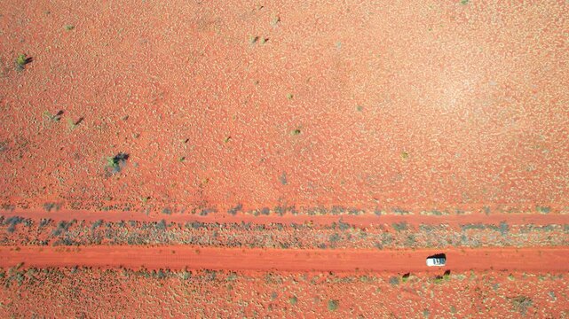 Remote track across the red Australian outback