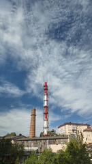 Obraz premium Boiler room in a residential area against the backdrop of a sky with clouds