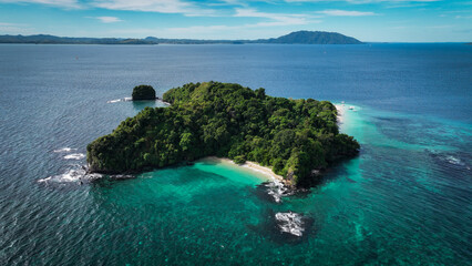Aerial view of Nosy Tanikely island in Madagascar showcasing its lush greenery and turquoise waters