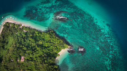 Aerial view of Nosy Tanikely island in Madagascar showcasing its stunning turquoise waters and lush...