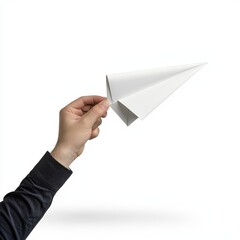 A hand holding a white paper airplane, symbolizing creativity, childhood, and imaginative play in a minimalistic setting.