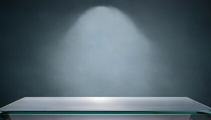 Clear glass countertop with a bare shelf. Kitchen counter with spot light on a gray background.