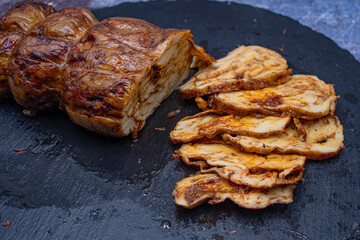 Mock meat- plant based alternative - seitan. Washed flour gluten with spices,  steamed and roasted.