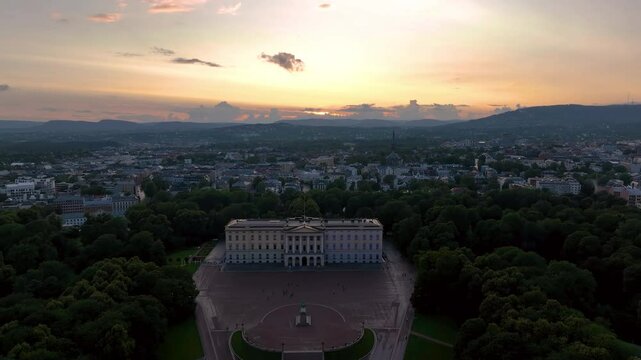 4K aerial video of the Royal Palace (Det kongelige slott) and Statue of King Karl Johan Oslo. In the background the castle park. Oslo, Norway.