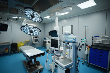 Modern operating room with equipment and medical devices