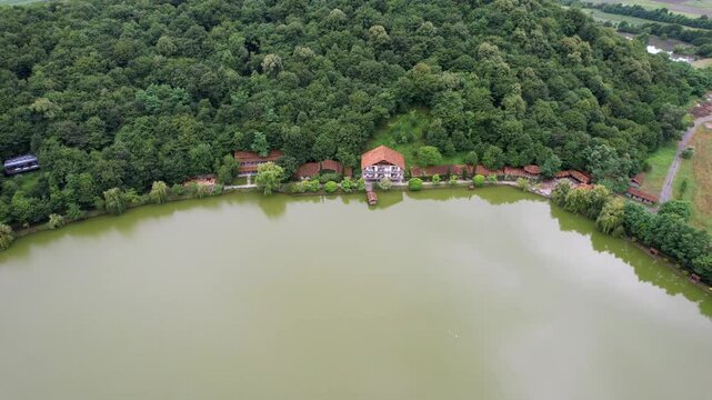 A drone flying over Lopota Pier, nestled on the serene Lopota Lake in Napareuli, Georgia