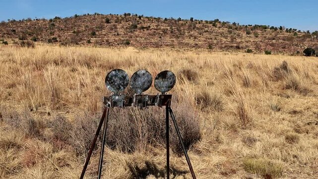 Firearm training outdoors with steel targets, high tension, and slow-motion shooting drills - Mastering precision and marksmanship in a training situation