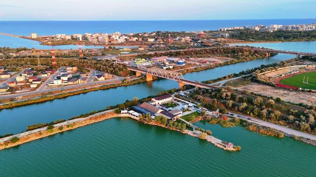 Aerial view of Tasaul lake and the Black sea in the distance at sunset