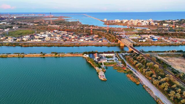 Panoramic aerial view of the branch of Danube-Black sea canal meeting the sea at Navodari