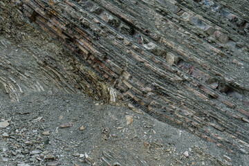 Slices of chondrite rock on the slopes of Caucasus mountains