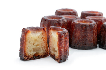 Canelé cookies isolated in white background