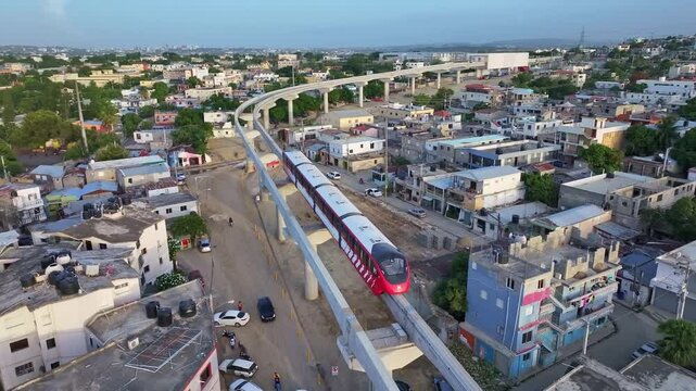 Spectacular aerial drone footage of Santiago's monorail during its first test, providing a wide view of its journey through the city.