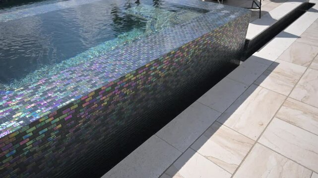gorgeous colorful iridescent outdoor pool and spa tiling