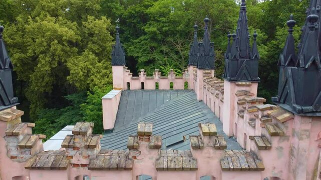 Close-up aerial movement from the Pac Palace ruin rooftop details, Dowspuda, Northern Poland.