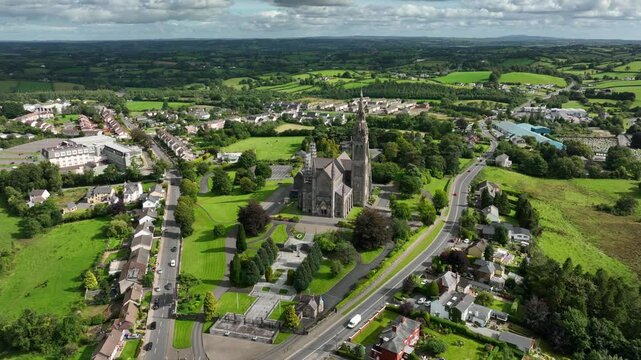 St. Macartan's Cathedral, County Monaghan, Ireland, September 2022. Drone orbits clockwise while descending towards the scaffolding clad Gothic Revival architecture as the chuch is carefully restored.