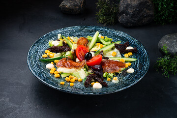 Fresh salad with fried suluguni cheese, sun-dried tomatoes, corn, cucumbers, lettuce and sauce.