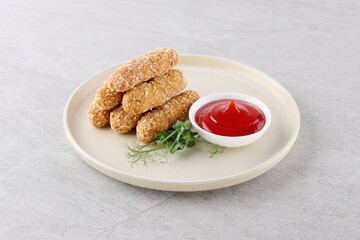 appetizer shareable starter small white saucer plate six deep-fried cheesy mozzarella sticks red...