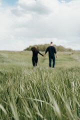 Couple in field background