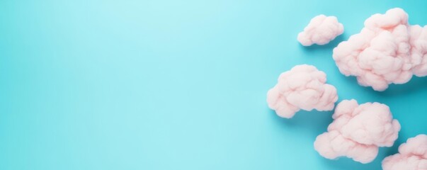 Soft pastel clouds in a faded sky blue background, pastel background, dreamy scene