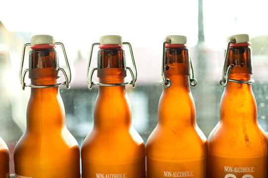 dark glass beer bottles with bugel plug . Glass, containers, alcohol  freshness, drink, pub, bar, hops
