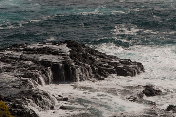 view of beautiful sea and rocks in daytime