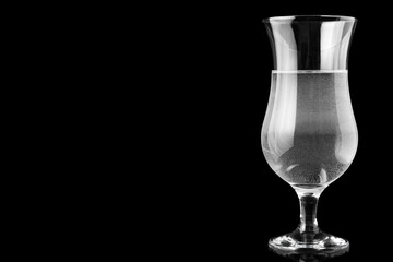 Hurricane glass filled with water