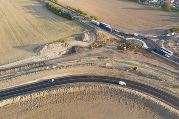 Aerial top view of roundabout under construction. development of new residential area. A roundabout...