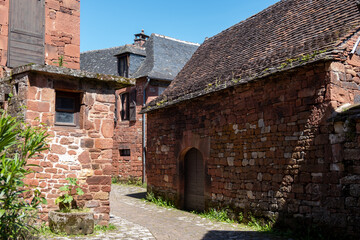 Collonges-la-Rouge village, one of the most beautiful villages in France with houses made from red stones, tourists destination in Dordogne