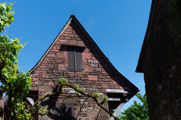 Collonges-la-Rouge village, one of the most beautiful villages in France with houses made from red...