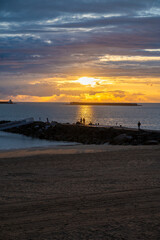 Naklejka premium Ciboure and Saint Jean de Luz bay and sandy beach on Basque coast on sunset, famous resorts, known for beautiful architecture, nature and cuisine, South of France, Basque Country